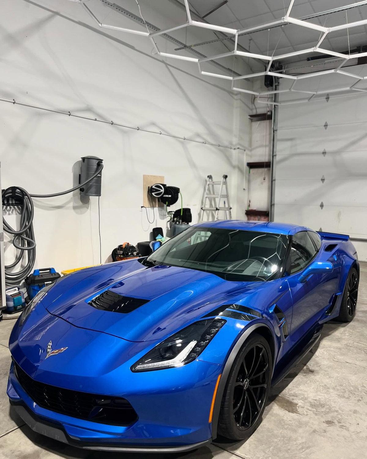Glossy blue Corvette after professional detailing